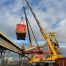 Démontage d’une grue portuaire avec 3 grues